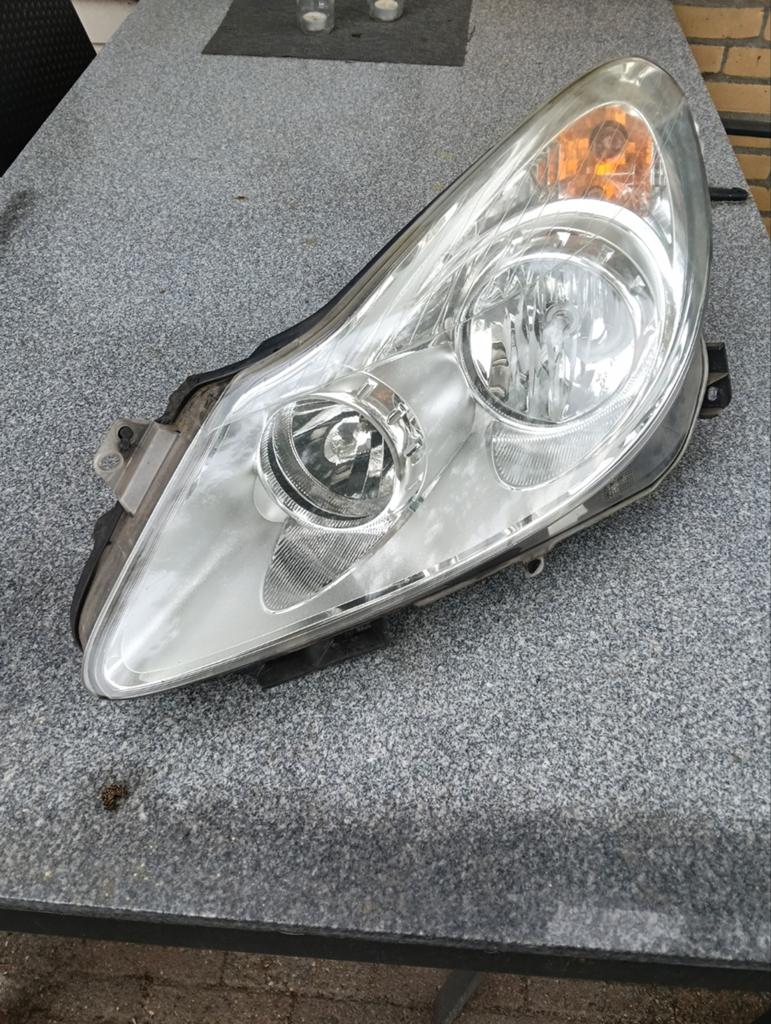 Koplamp bestuurderskant Opel Corsa D tot november 2010, Ophalen, Opel