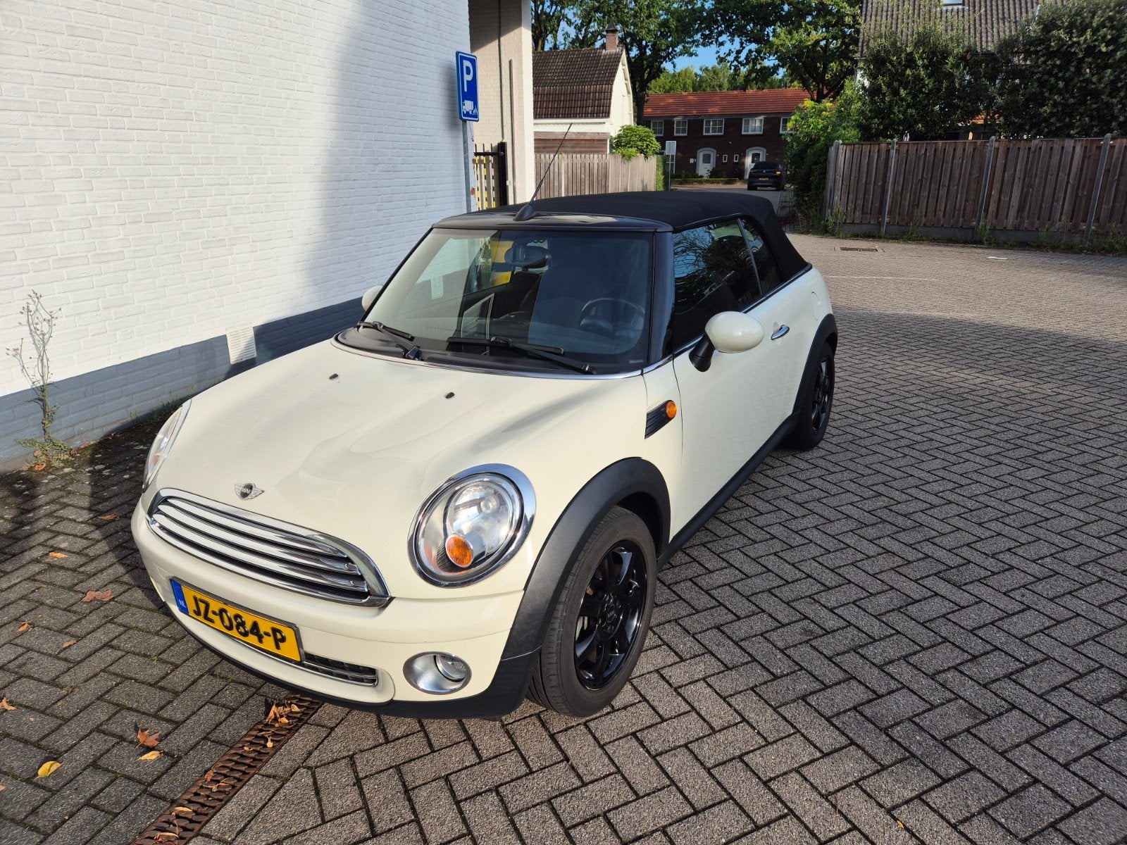 Mini Cooper Cabrio 2009,  km stand 165419, Auto's, Voorwielaandrijving, Cabriolet, 1600 cc, Leder en Stof