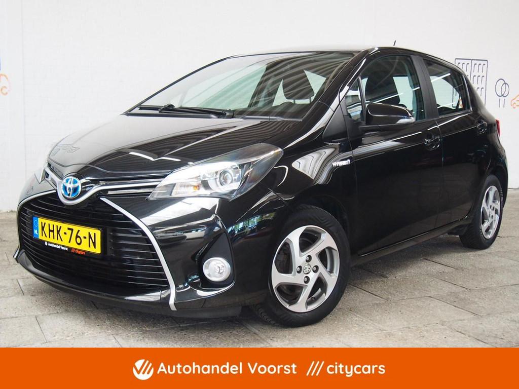 Toyota Yaris 1.5 Hybrid Dynamic Cruise Camera (APK:Nieuw) In, Auto's, 4 cilinders, Met garantie (alle), Zwart, Bedrijf