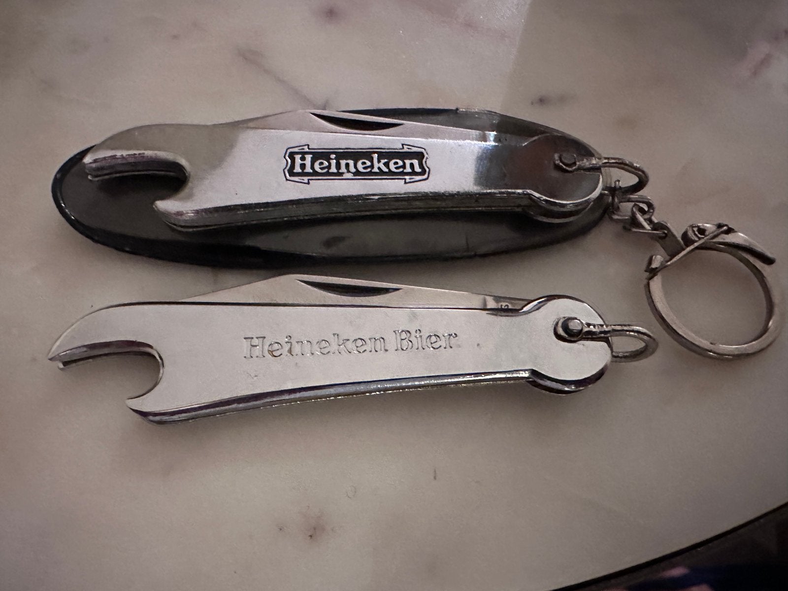 Oude Heineken flesopener met zakmesje, Verzamelen, Ophalen, Zo goed als nieuw, Flesopener, Heineken