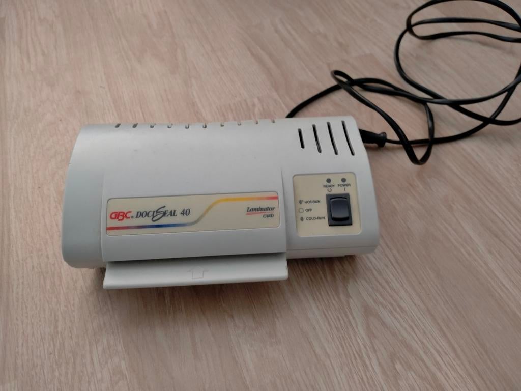 Klein lamineer apparaat., Ophalen