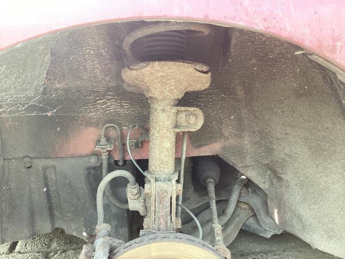 Schokdemper links-voor van een Suzuki Alto, Auto-onderdelen, Ophanging en Onderstel, Suzuki, Gebruikt, 3 maanden garantie, Ophalen of Verzenden