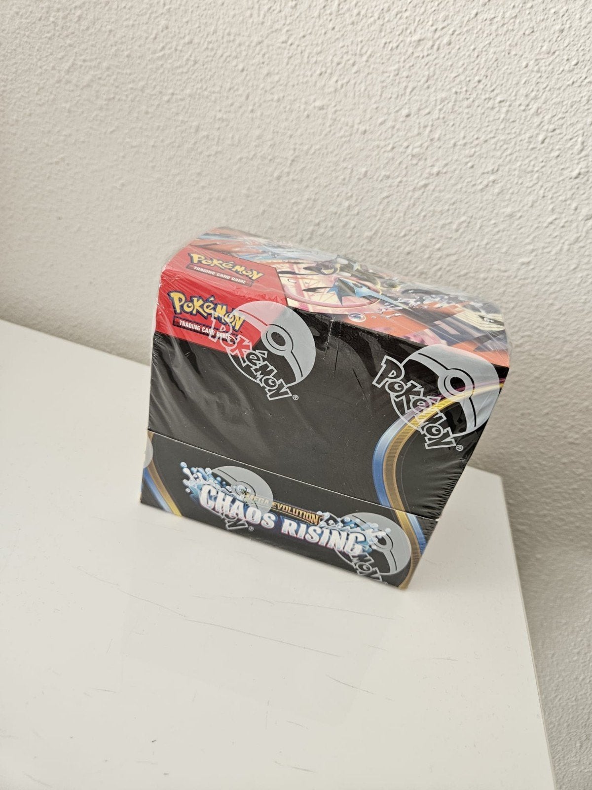 Pokémon TCG Booster Box Chaos Rising, Verzenden, Nieuw, Boosterbox