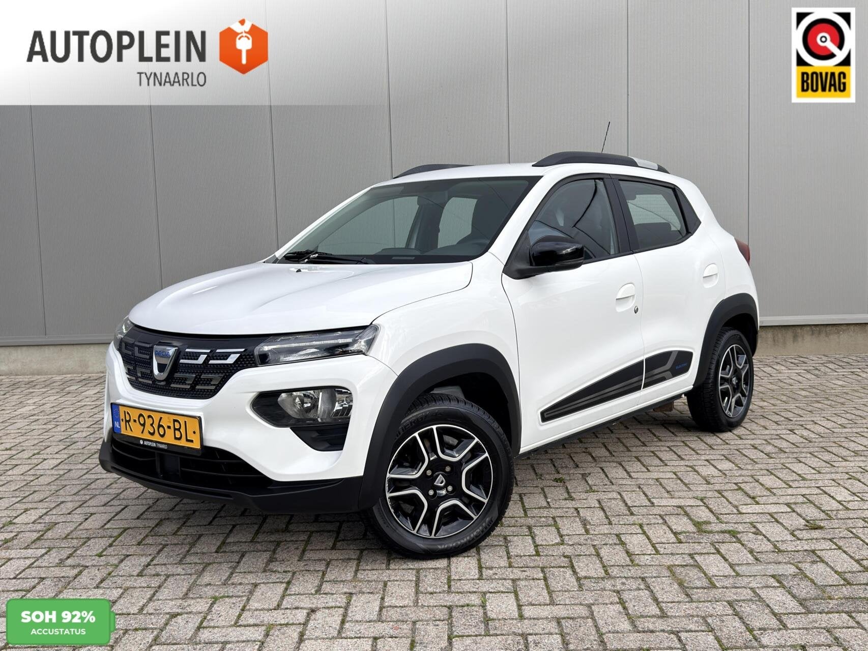 Dacia Spring Comfort Plus (Orange Pack) 27 kWh Carplay|Camer, Gebruikt, Met garantie (alle), 230 km, Wit