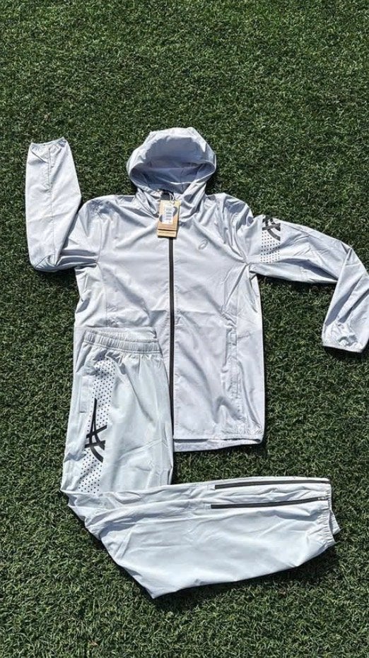 ASICS Trainingspak (Wit), Verzenden, Nieuw, Grijs, Hardlopen of Fietsen