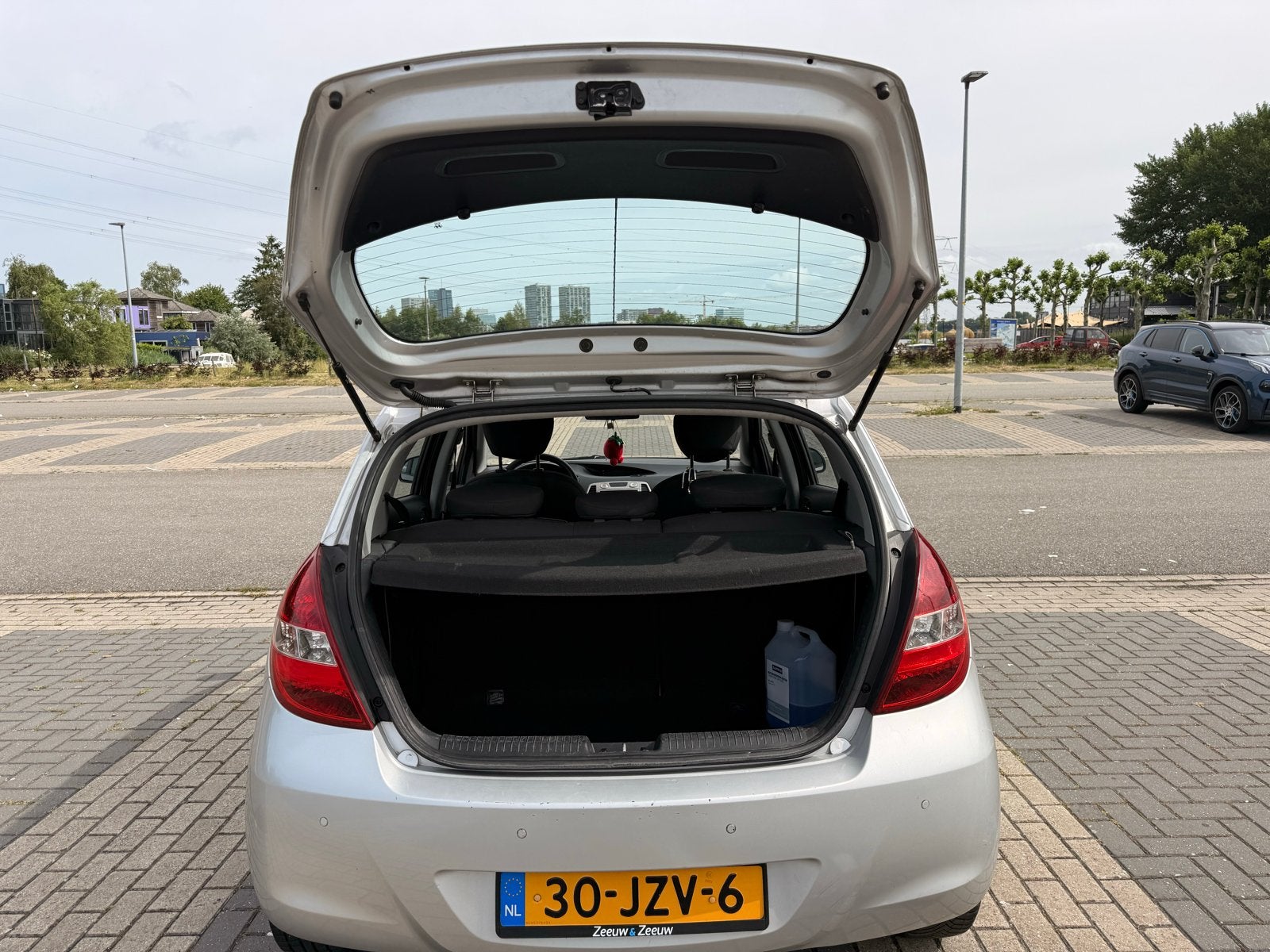 Hyundai i20 1.2 5-DRS 2009 Grijs, Auto's, Hyundai, 450 kg, 31 €/maand, 4 cilinders, Origineel Nederlands