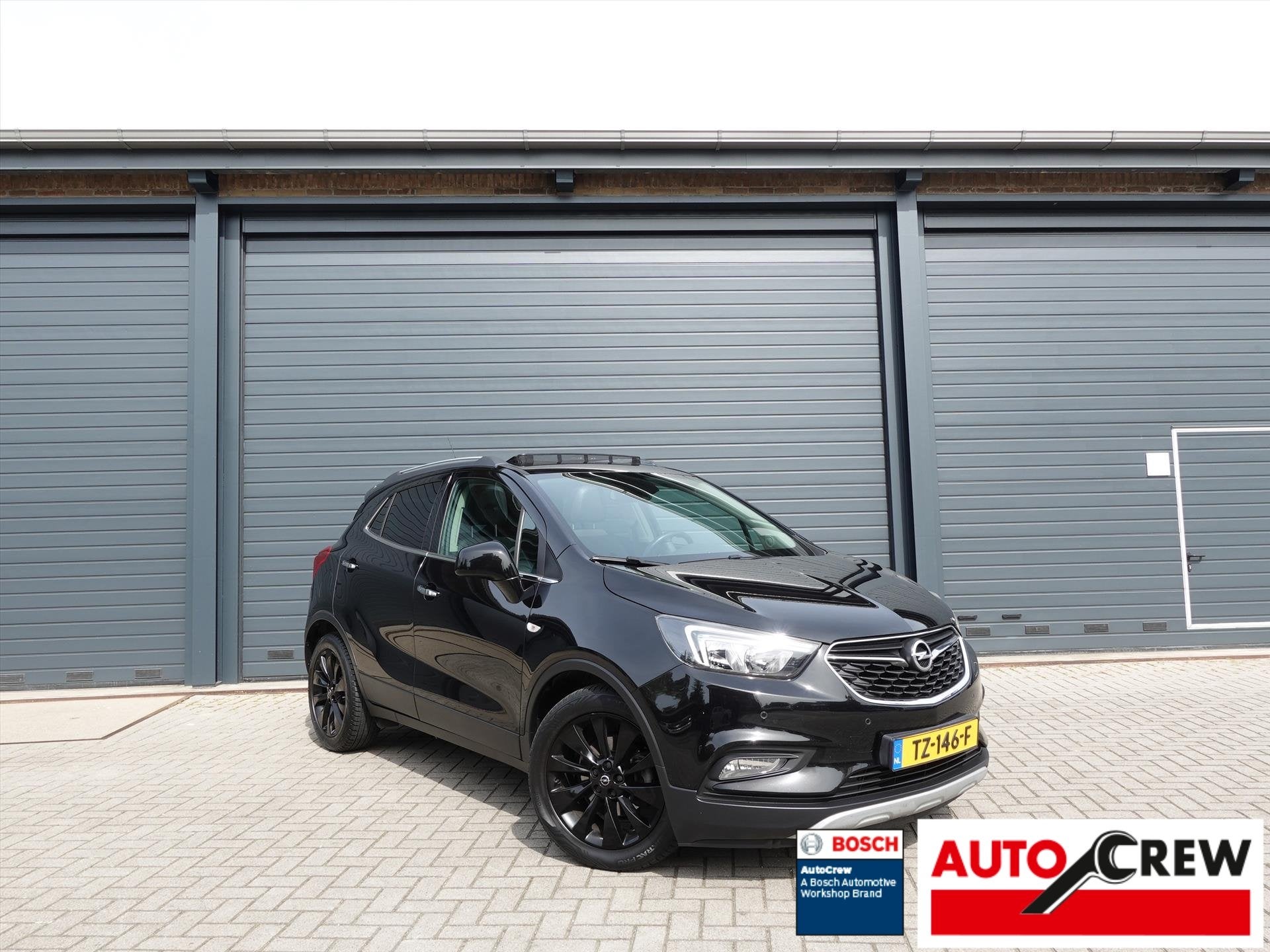 OPEL Mokka X 1.4 Turbo 140pk Black Edition AUT RIJKLAAR/STUU, Auto's, Automaat, 15 km/l, Gebruikt, Leder en Stof