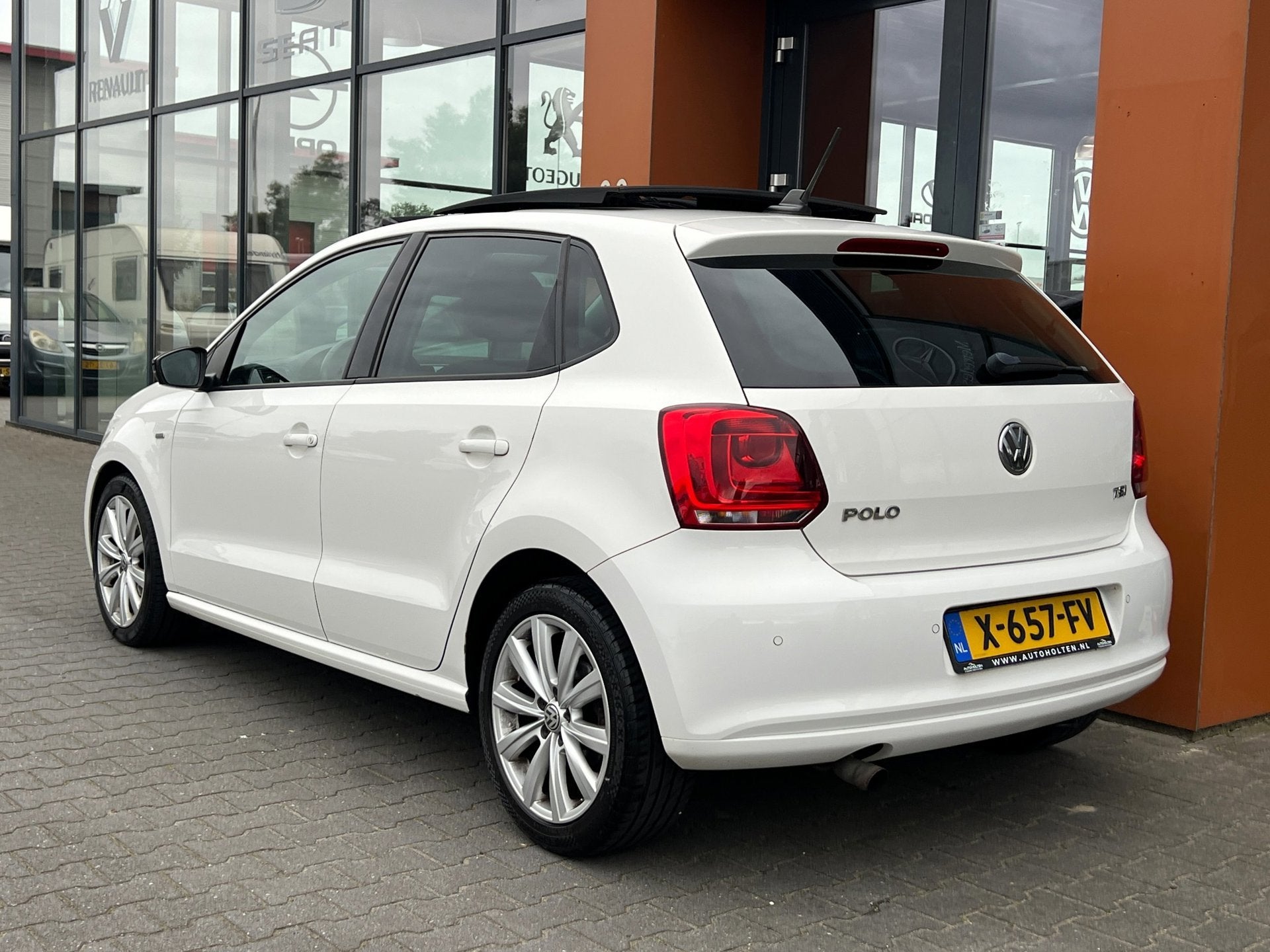 Volkswagen Polo 1.2TSI|Panodak|Stoelverw.|Xenon|Cruise|PDC, Voorwielaandrijving, Euro 5, Automatische klimaatregeling, Leder en Stof