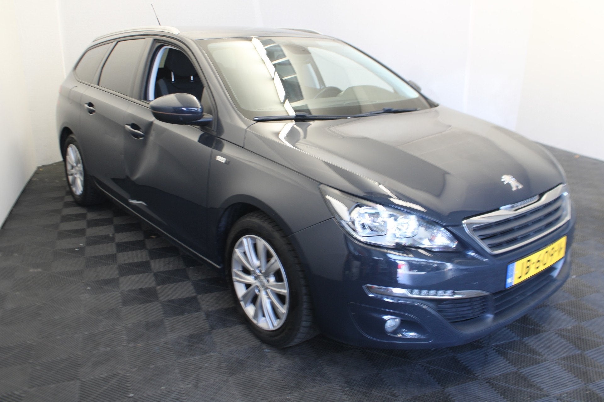 Peugeot 308 SW 1.2 PureTech Style (bj 2016, automaat), Auto's, Stof, 1199 cc, 635 kg, Origineel Nederlands