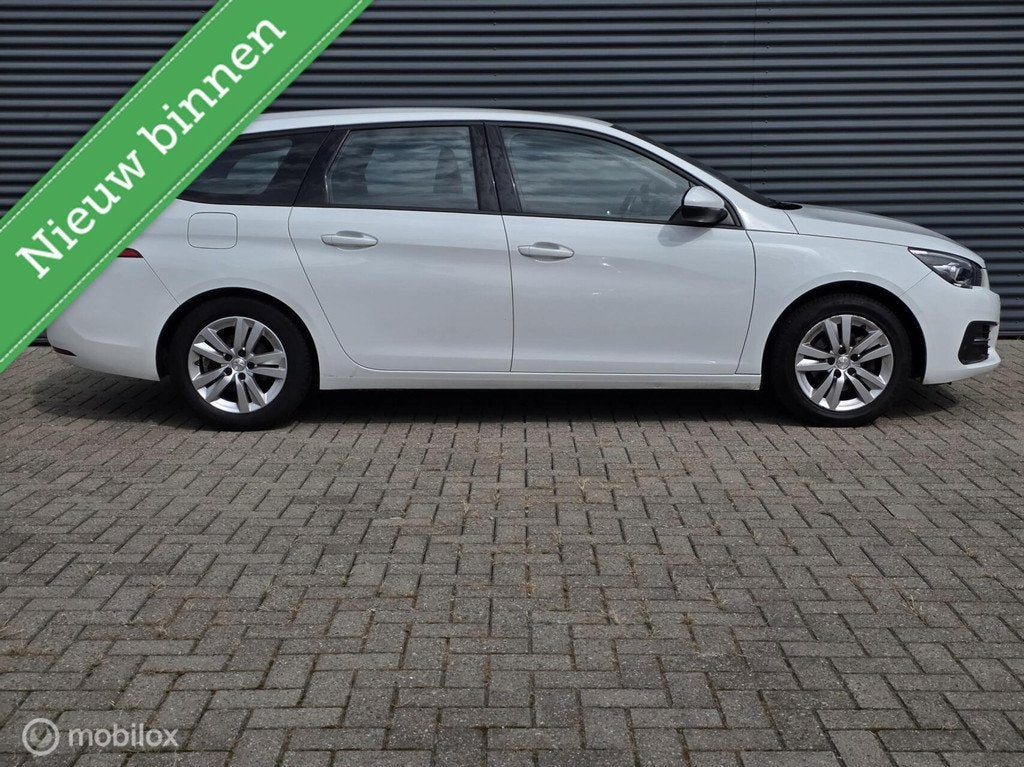 Peugeot 308 SW 1.2 PureTech Blue Lease Allure, Auto's, Voorwielaandrijving, Gebruikt, Euro 6, 1199 cc