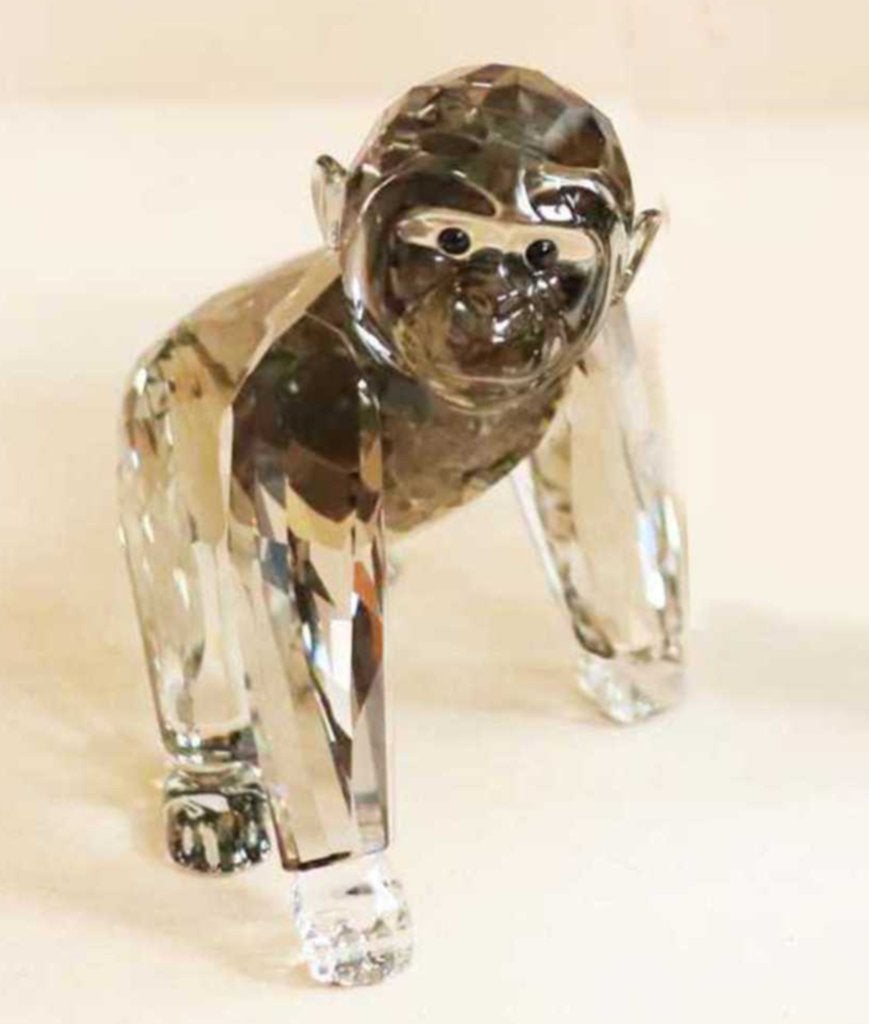 Swarovski Gorilla Baby 2009, compleet met doos & certificaat, Ophalen of Verzenden, Zo goed als nieuw, Figuurtje