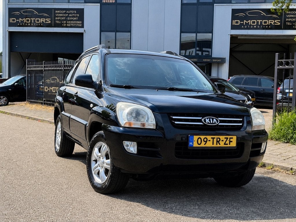 Kia Sportage 2.0 CVVT M-bition LUXE UITVOERING TREKHAAK LEER, 1442 kg, Gebruikt, 4 cilinders, Leder en Stof
