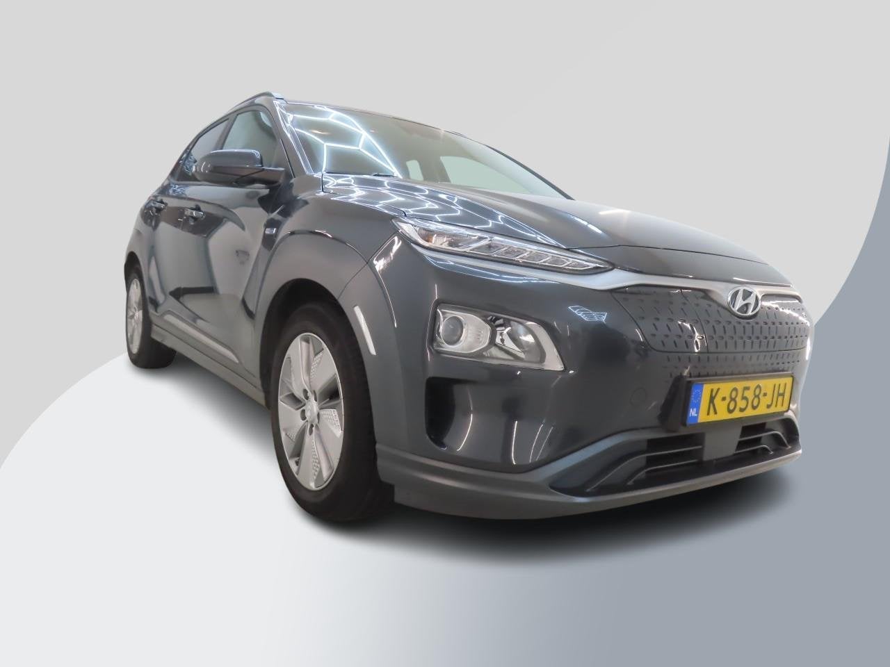 Hyundai Kona EV Fashion 64 kWh | SOH 98,9 % | Warmtepomp | N, Stof, Gebruikt, Verwarmde buitenspiegels, Origineel Nederlands