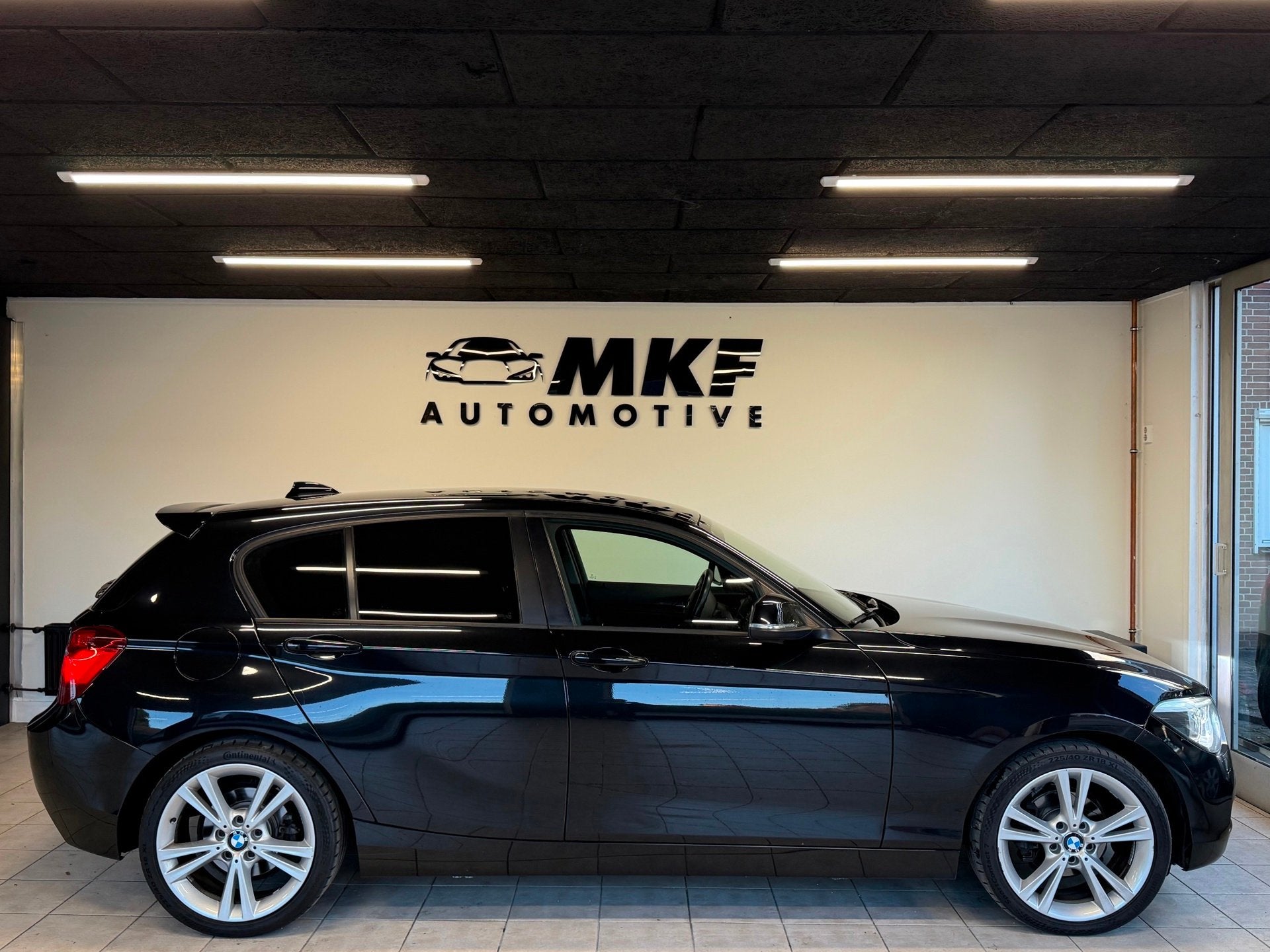Foto 9 van BMW 1-serie 116D Business 2012 Zwart AIRCO|NAVI|XENON|NAP!