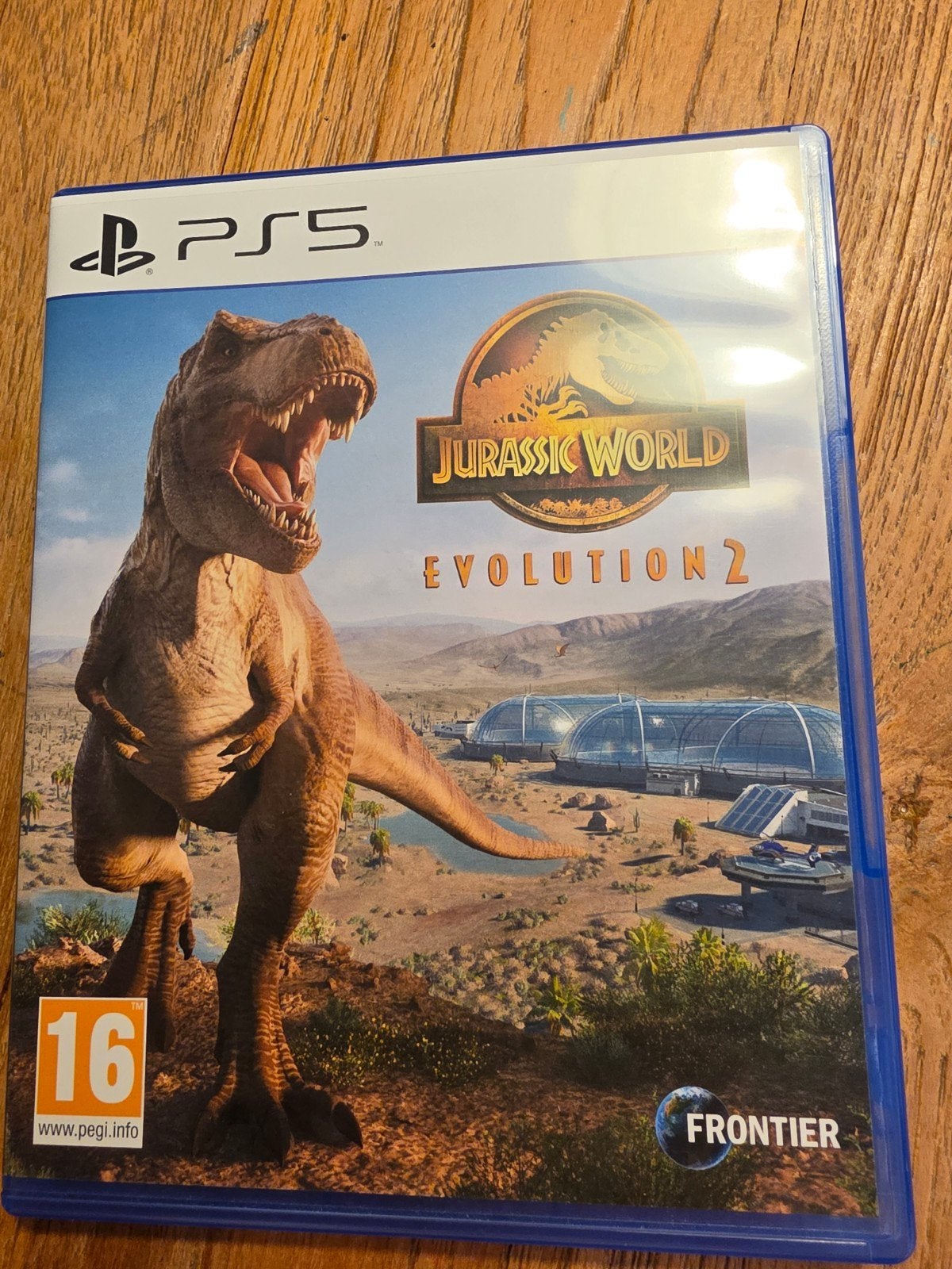 Jurassic World Evolution 2 PS5 - Zo goed als nieuw, Spelcomputers en Games, Verzenden, Zo goed als nieuw, Vanaf 16 jaar