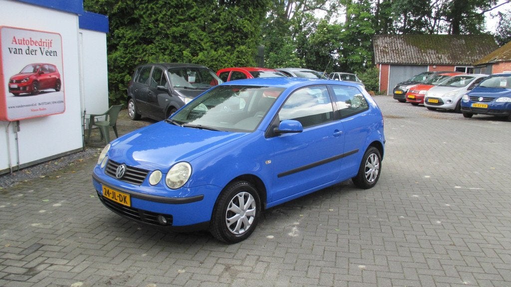 Volkswagen Polo 1.4-16V Comfortline, Auto's, Volkswagen, Voorwielaandrijving, Stof, 4 cilinders, Blauw