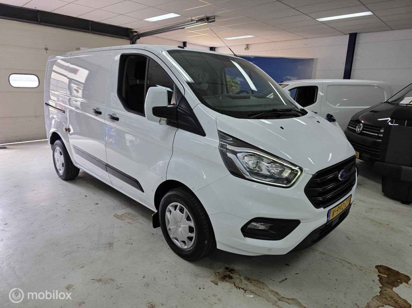 Ford Transit Custom 300 2.0 TDCI L1H1 Airco Cruise, Gebruikt, 4 cilinders, Wit, Origineel Nederlands