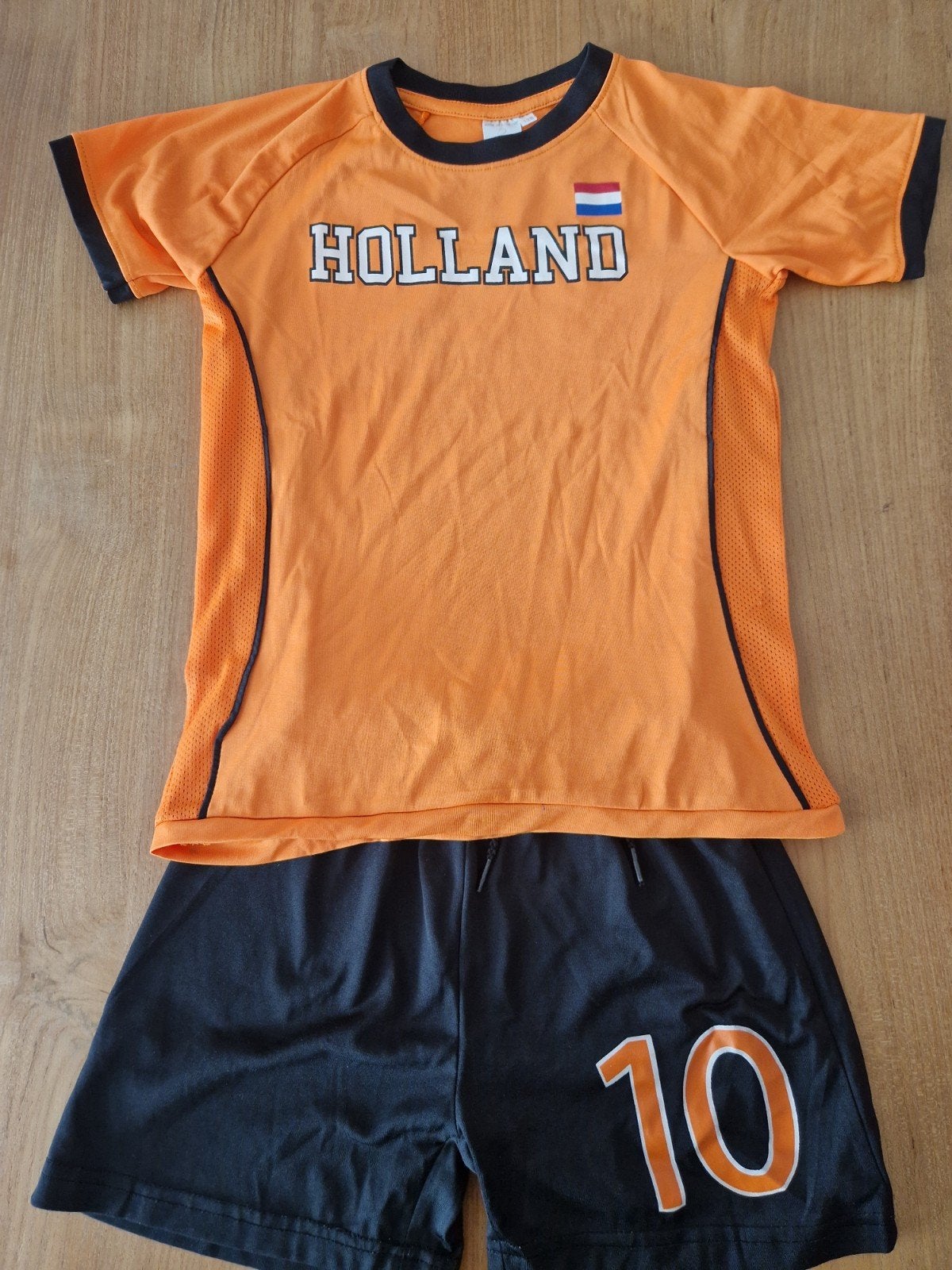 Oranje tenue Nederland maat 128, Ophalen of Verzenden, Zo goed als nieuw, Jongen of Meisje, Sport- of Zwemkleding