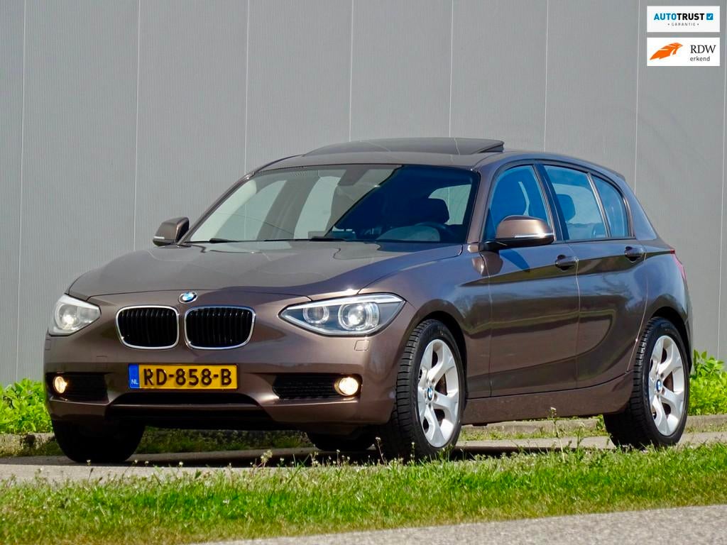 BMW 1-serie 116i Aut High Executive | Schuif/ Kantel dak | X, Euro 5, Gebruikt, Zwart, 4 cilinders