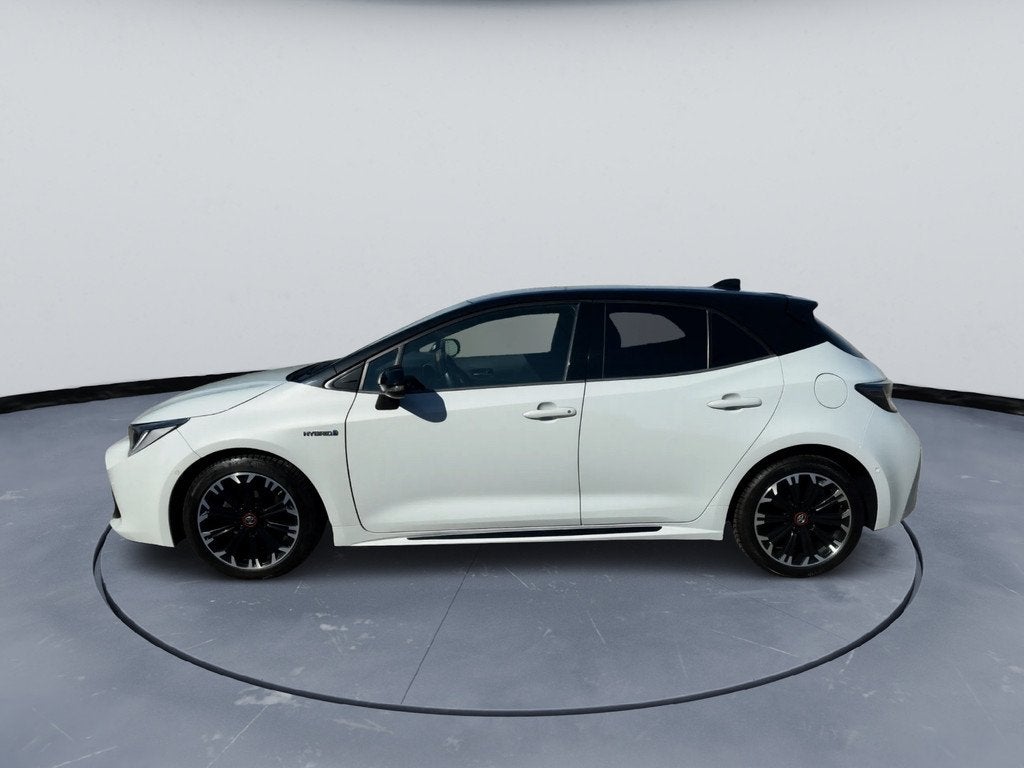 Toyota Corolla 1.8 Hybrid GR-Sport Half leder Achteruitrijca, Auto's, Toyota, Gebruikt, Zwart, 4 cilinders, 98 pk