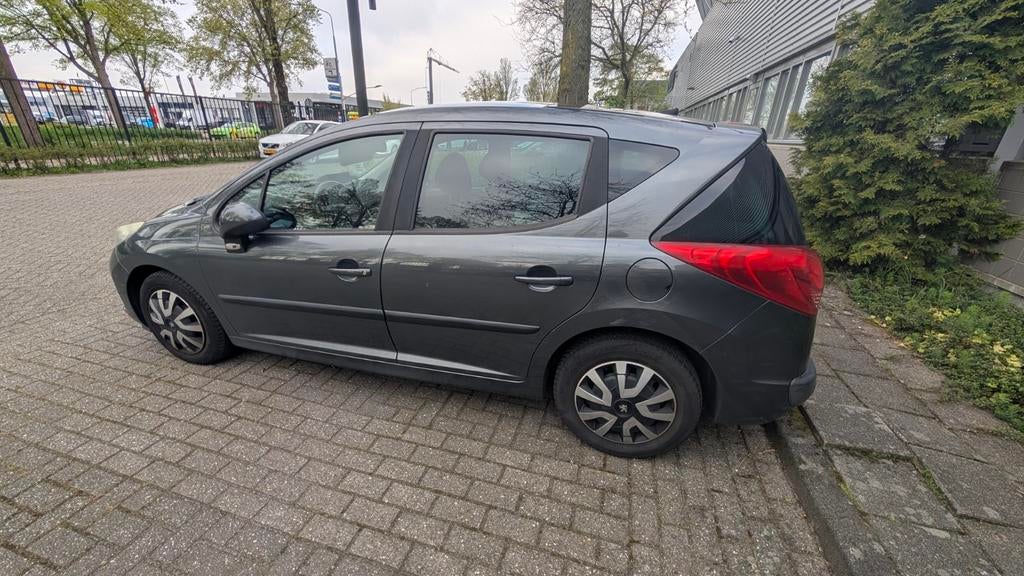 Peugeot 207 SW 1.6 VTi 16V 120pk Aut. 2008 Grijs, 4 cilinders, 14 km/l, Stationwagon, Euro 4
