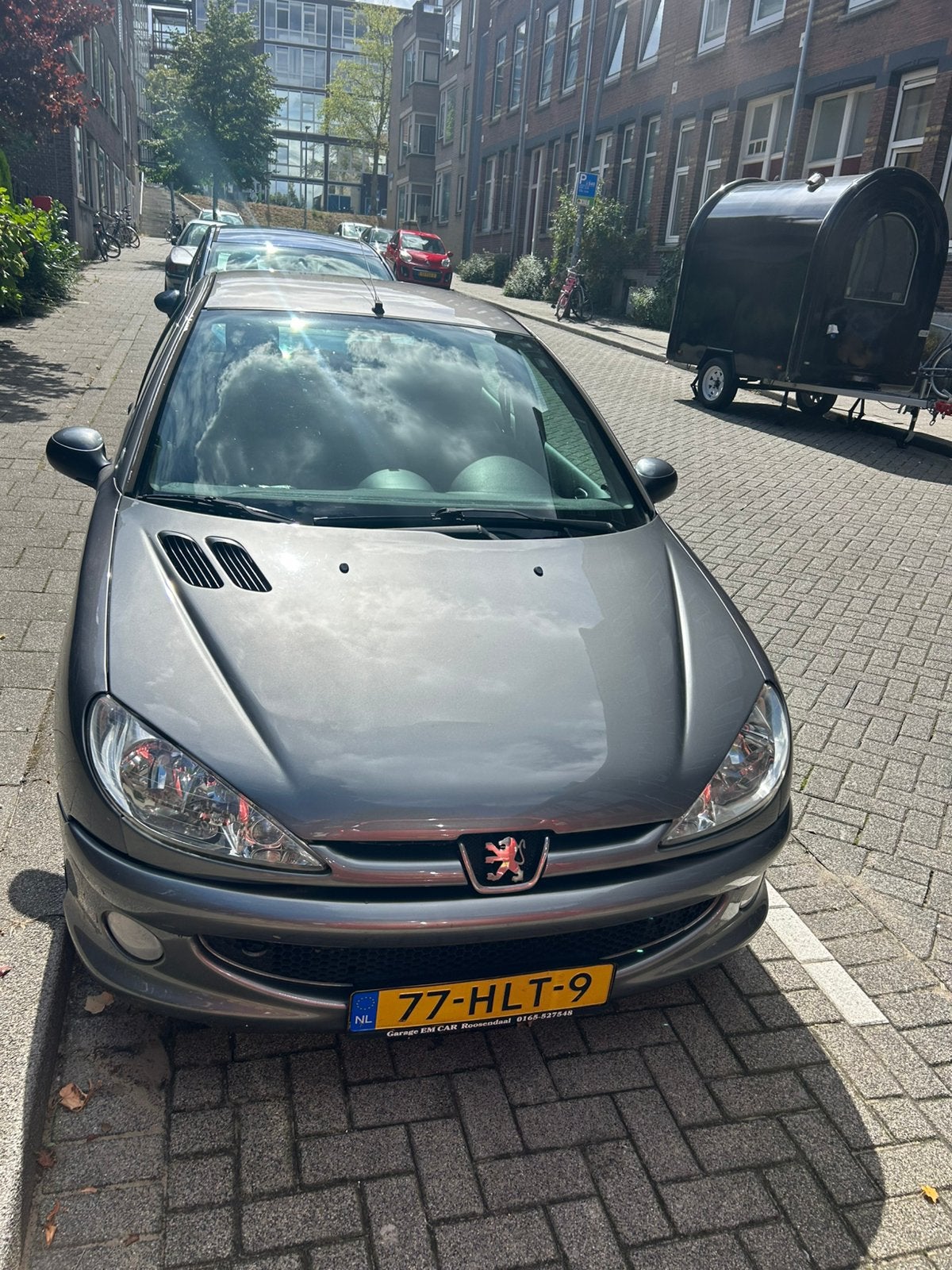 Peugeot 206 1.4 5D 2009 Grijs, Auto's, Voorwielaandrijving, 31 €/maand, 4 cilinders, Origineel Nederlands
