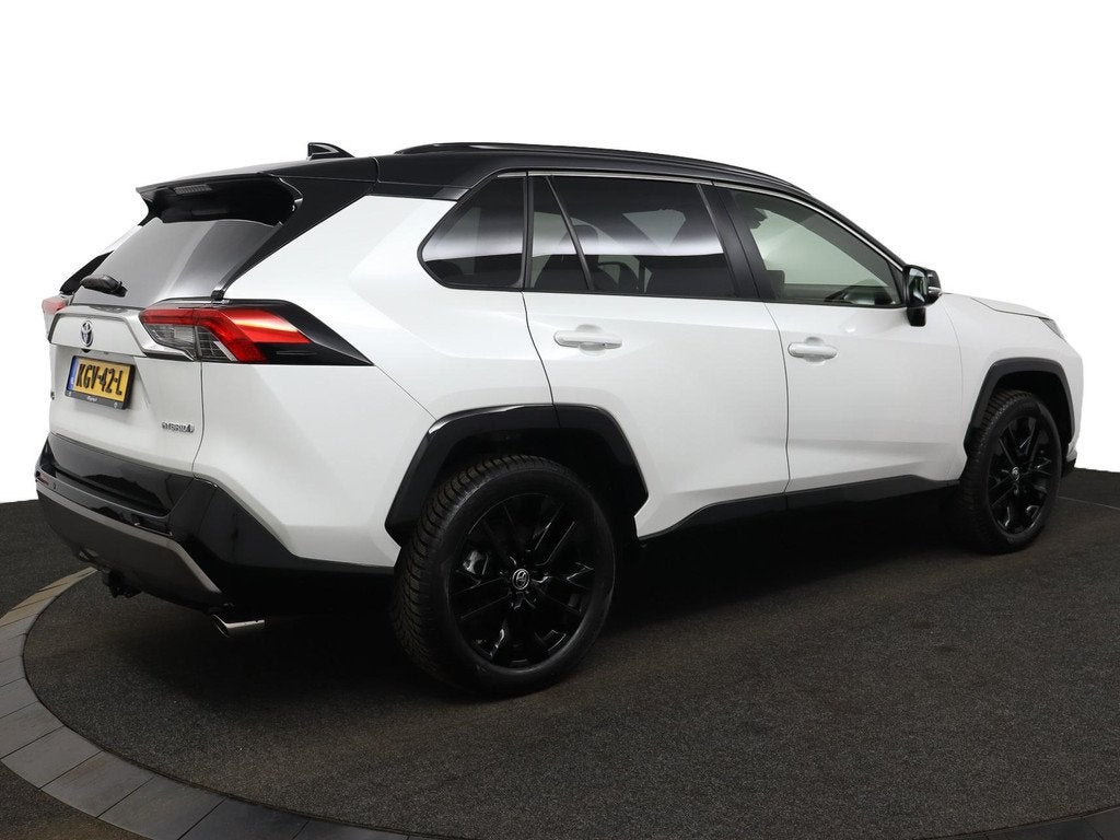 Toyota RAV4 2.5 Hybrid AWD Bi-Tone | Stoel- en Stuurwielverw, Auto's, Toyota, Automaat, 12 maanden, Gebruikt, 4 cilinders