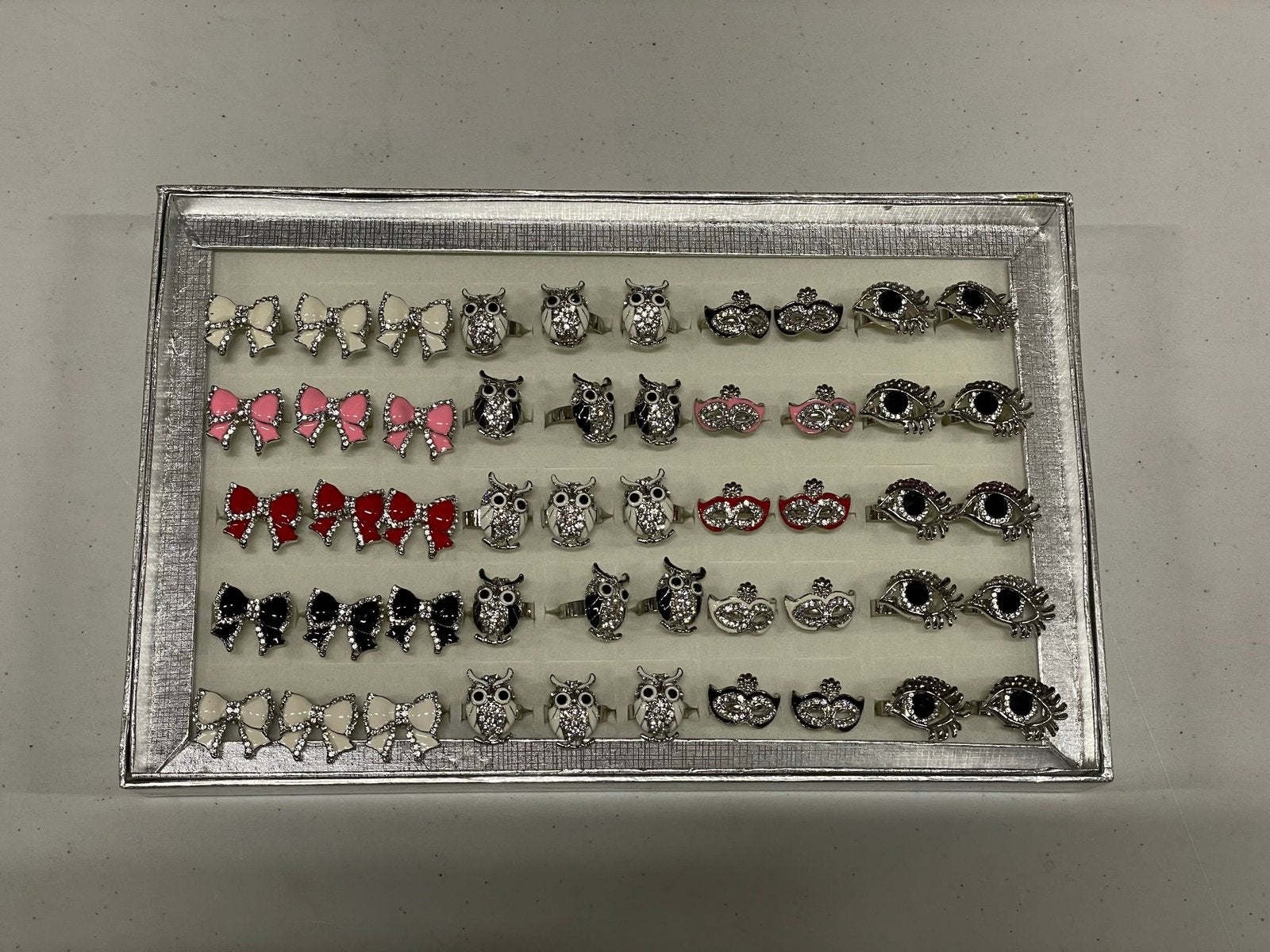 Display met 50 verstelbare ringen: strik, uil, masker, oog, Overige materialen, Overige kleuren, Nieuw, Ophalen of Verzenden