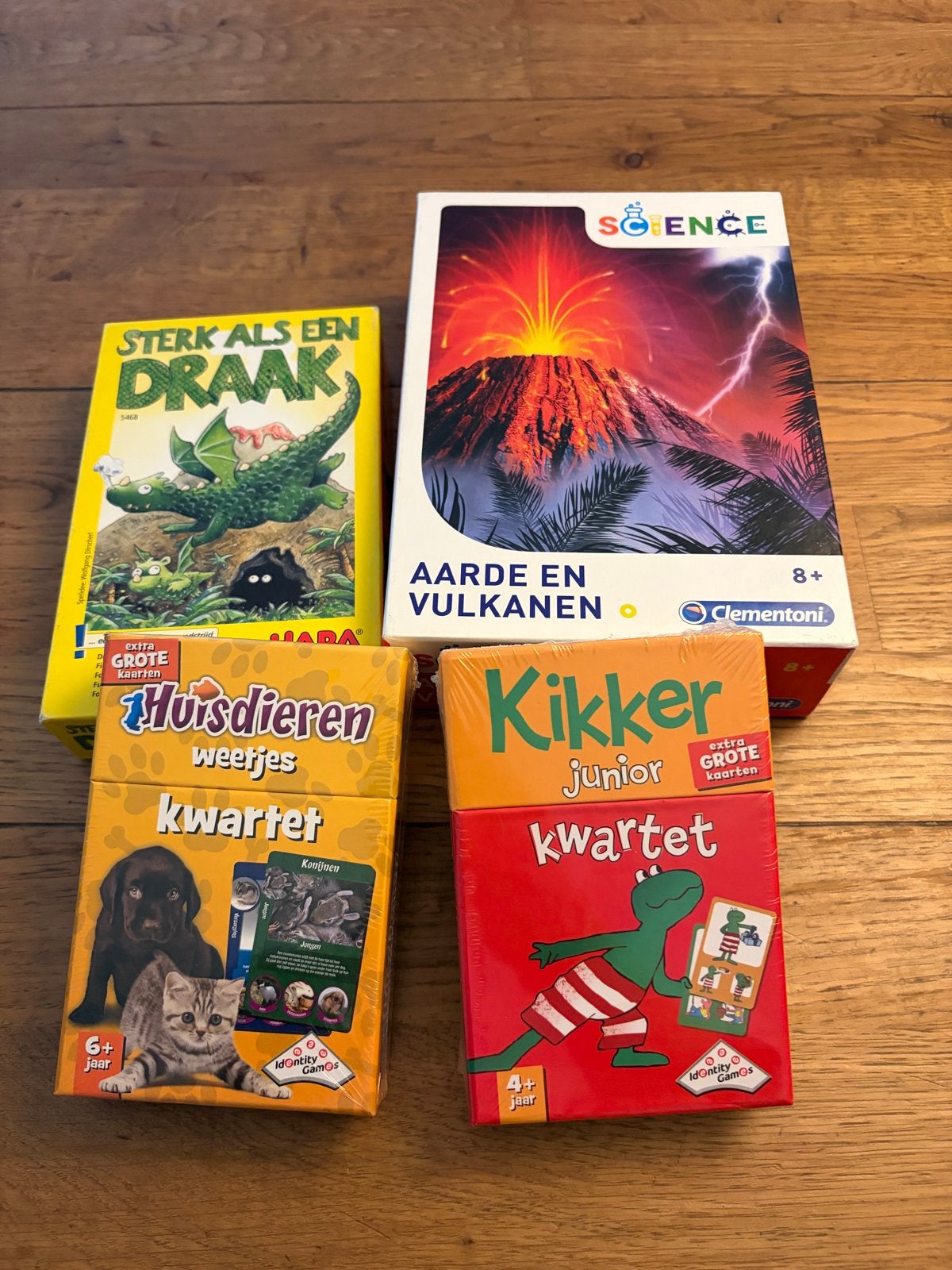 Set van 4 leuke spellen: Vulkaan | Drakenspel | 2 kwartetten, Een of twee spelers, Ophalen, Zo goed als nieuw