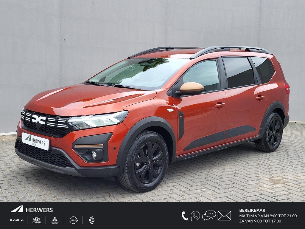 Dacia Jogger 1.6 Hybrid 140 Extreme 7p Automaat / 7- persoon, Auto's, Dacia, Gebruikt, 4 cilinders, Bruin, 7 stoelen