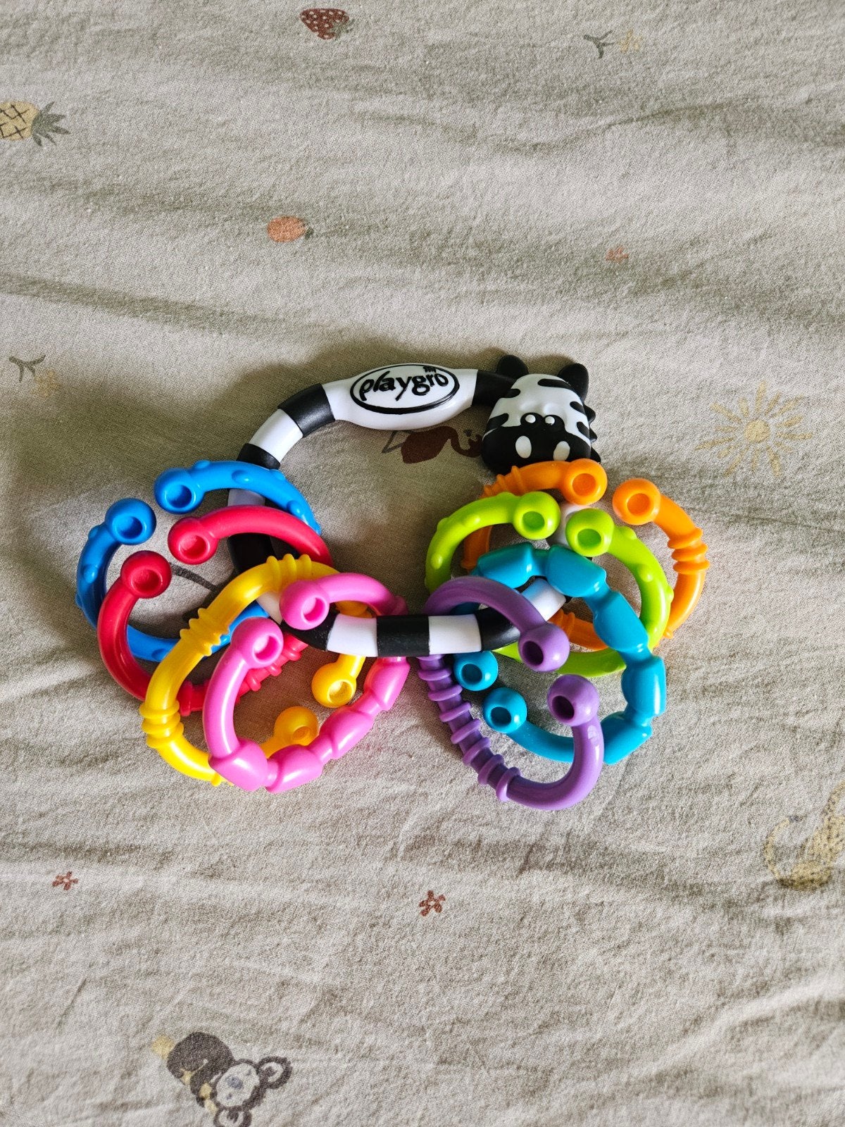 Playgro Rammelaar met bijtringen en zebra-design, Ophalen of Verzenden, Zo goed als nieuw, Rammelaar