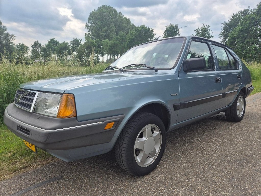 Volvo 340 1.4 GL AUT K9 1991 Blauw, Auto's, Volvo, Particulier, Elektrische ramen, Stoelverwarming, Trekhaak, Benzine, Hatchback