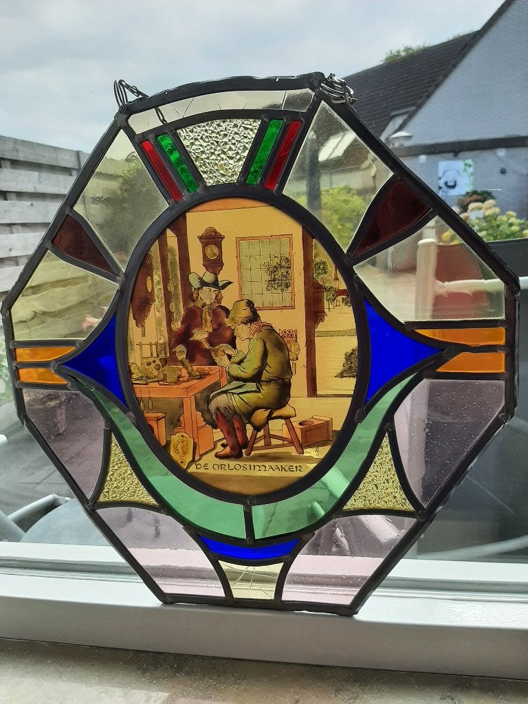 Glas in lood raamhanger, Ophalen