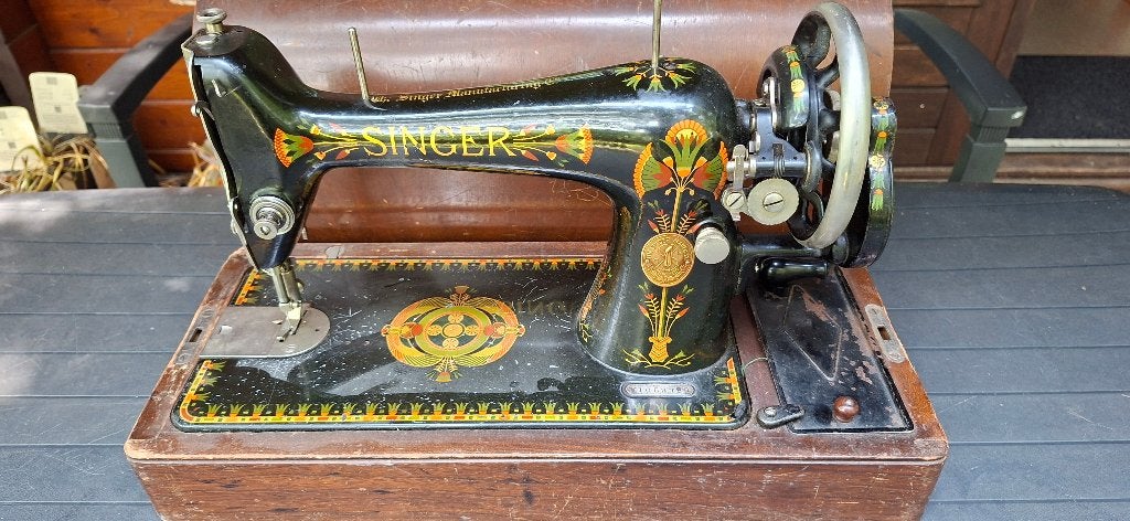 Oude Singer naaimachine., Ophalen