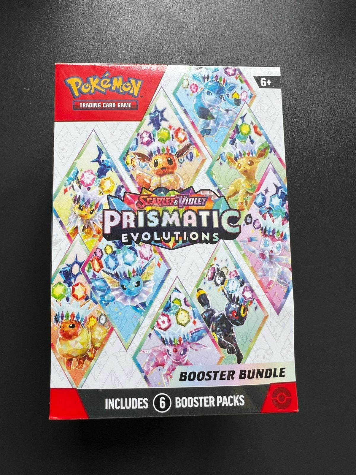 Prismatic evolutions booster bundle, Ophalen of Verzenden, Zo goed als nieuw