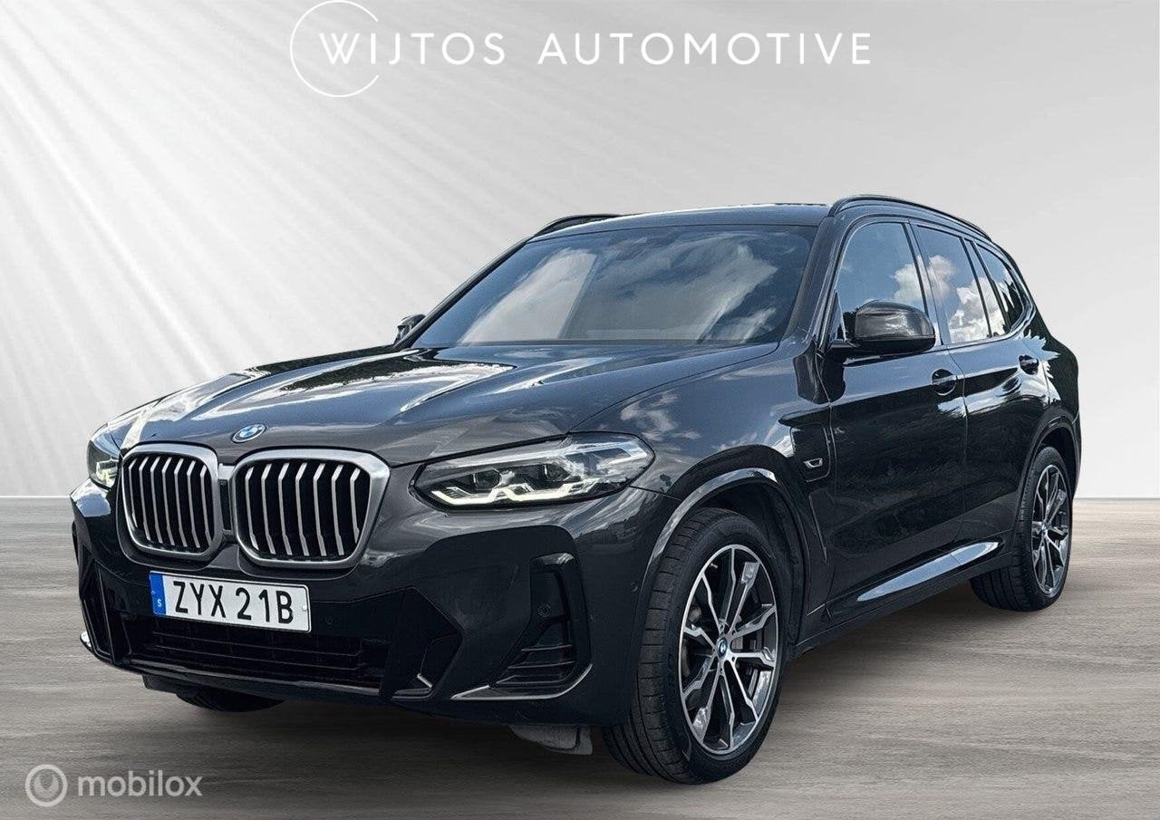 BMW X3 xDrive30e M-Sport, leer, trekhaak, Auto's, Automaat, Gebruikt, Zwart, Bedrijf