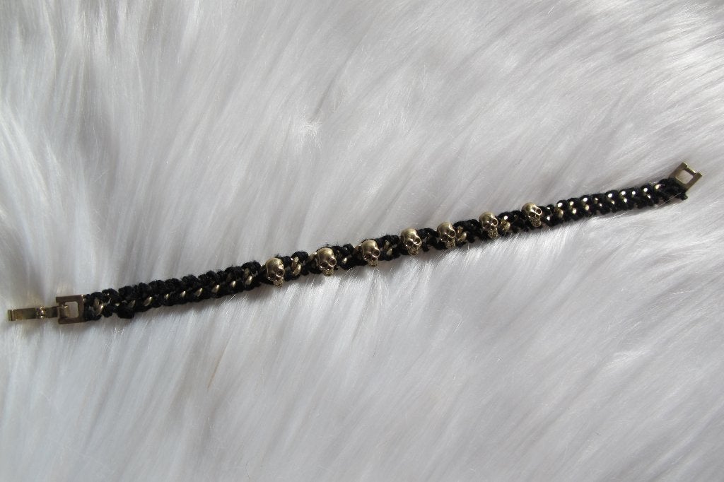 Gold skulls bracelet, Sieraden, Tassen en Uiterlijk, Armbanden, Ophalen of Verzenden, Gebruikt, Zwart, Overige materialen