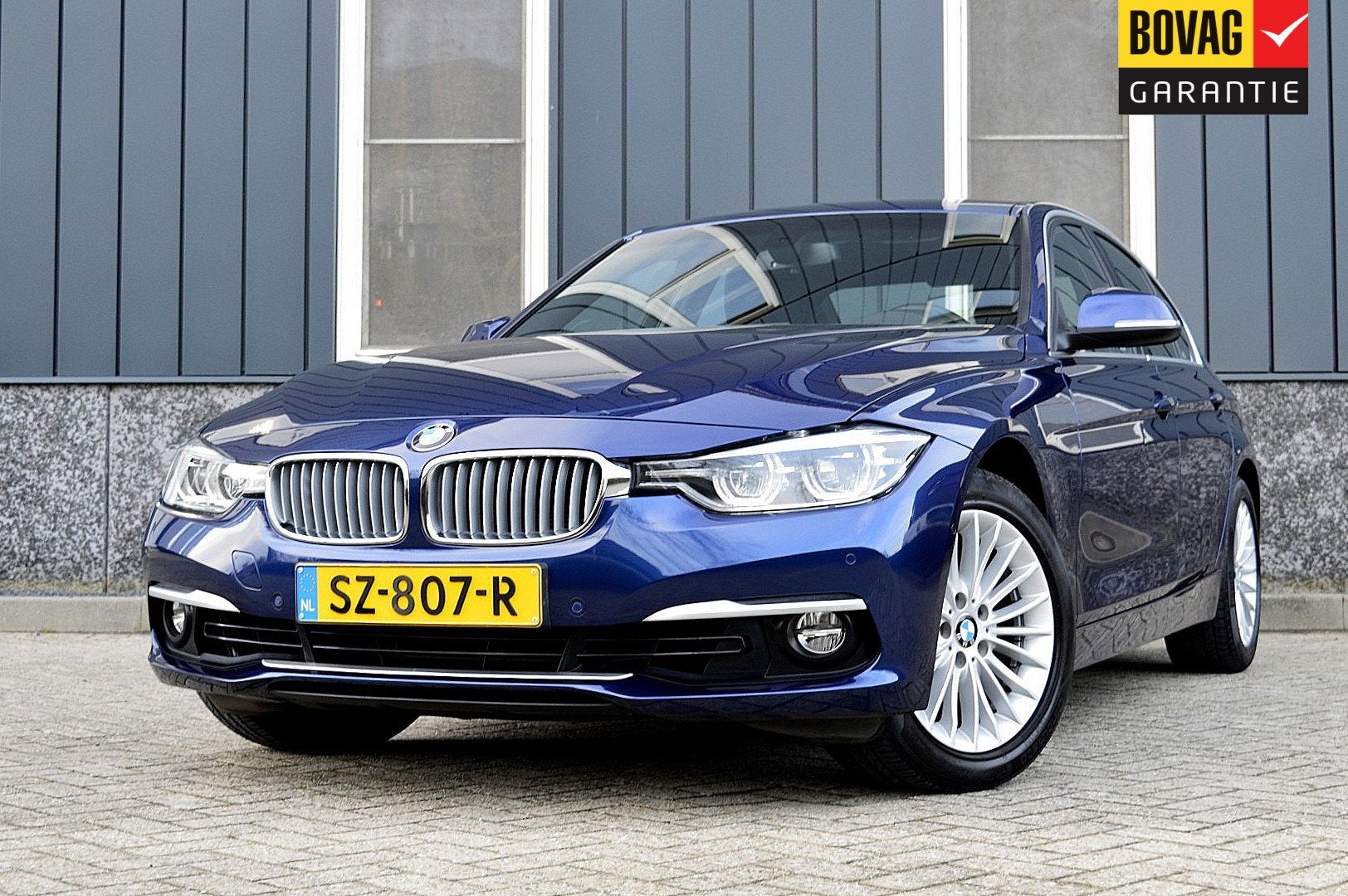 BMW 3 Serie 318i Luxury Edition Rijklaarprijs-Garantie Navig, Auto's, Automaat, Gebruikt, Blauw, 19 km/l