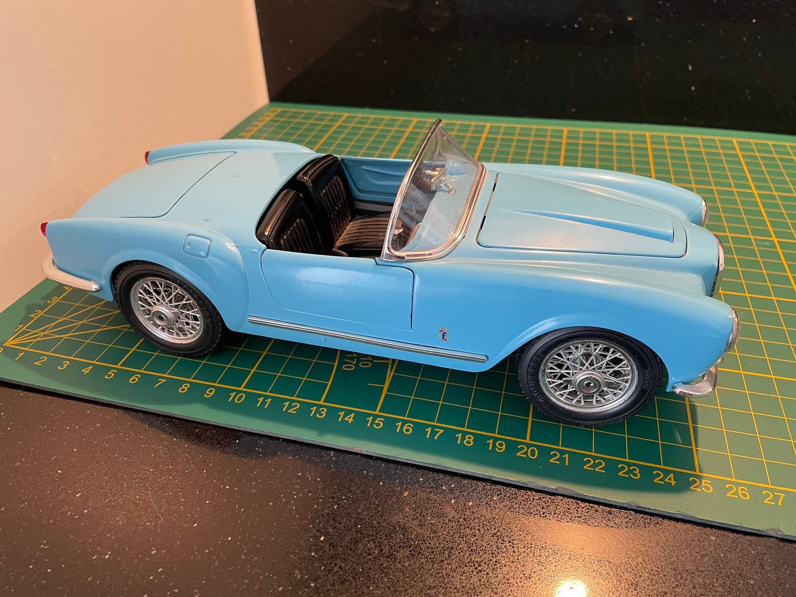 Lancia Aurelia B24 Spider (1955) Bburago 1/18 lichtblauw, Ophalen of Verzenden, Gebruikt, Auto, Bburago
