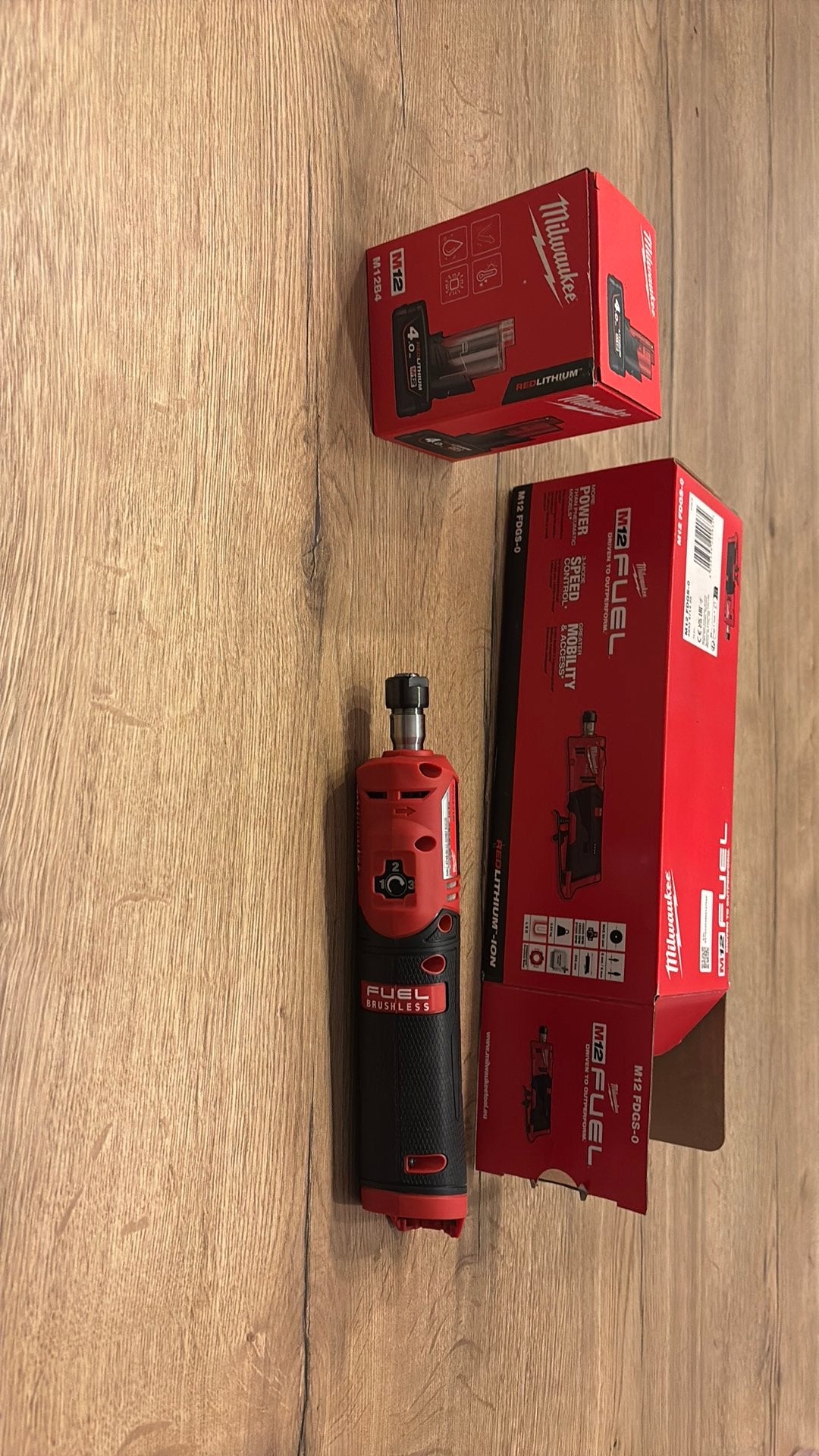 Milwaukee m12 rechte stift frees met 4.0 accu, Zo goed als nieuw
