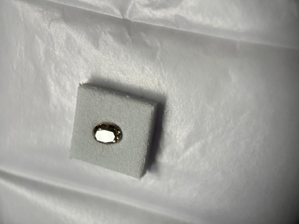 Natural diamond oval brilliant-cut 0,65 ct (67), Ophalen of Verzenden, Zo goed als nieuw