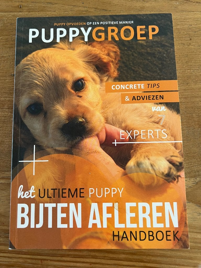 Puppy bijten afleren boek, Ophalen of Verzenden, Zo goed als nieuw, Honden
