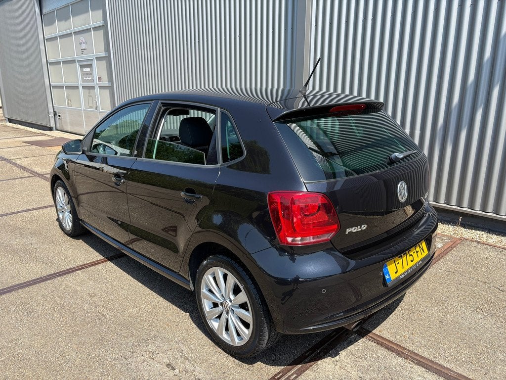 Volkswagen Polo 1.2 TSI Highline, Auto's, Volkswagen, Voorwielaandrijving, Euro 5, Zwart, 988 kg
