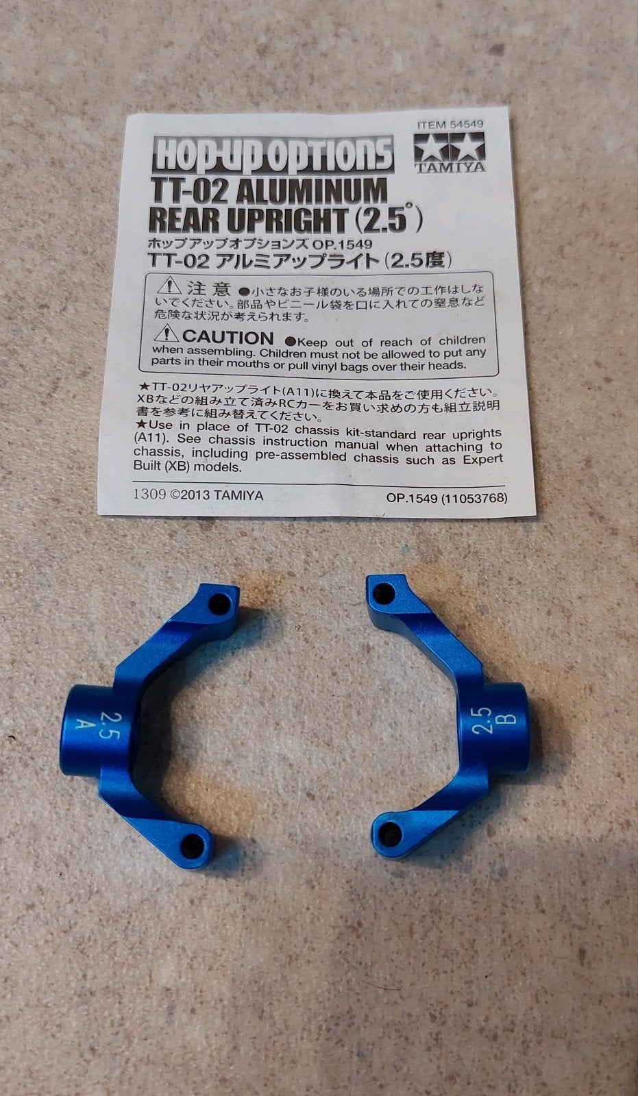 Nieuwe Tamiya TT02 Aluminum rear Uprights 2.5 graden, Hobby en Vrije tijd, Modelbouw | Radiografisch | Auto's, Ophalen of Verzenden