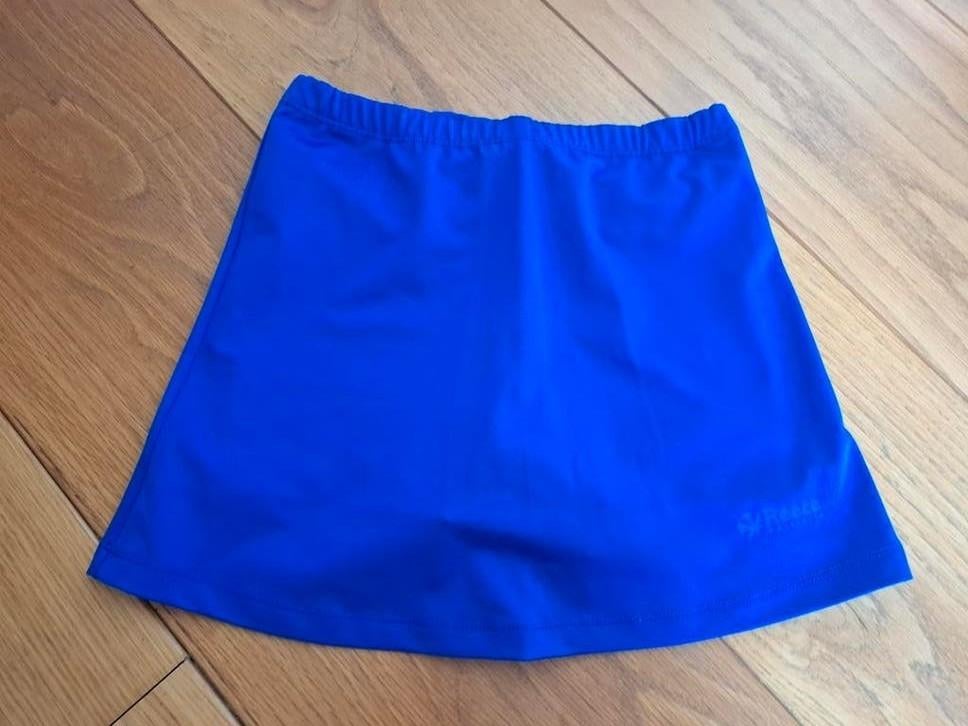 Reece hockeyrokje maat 140 - Blauw, Sport en Fitness, Hockey, Ophalen of Verzenden, Gebruikt, Kleding