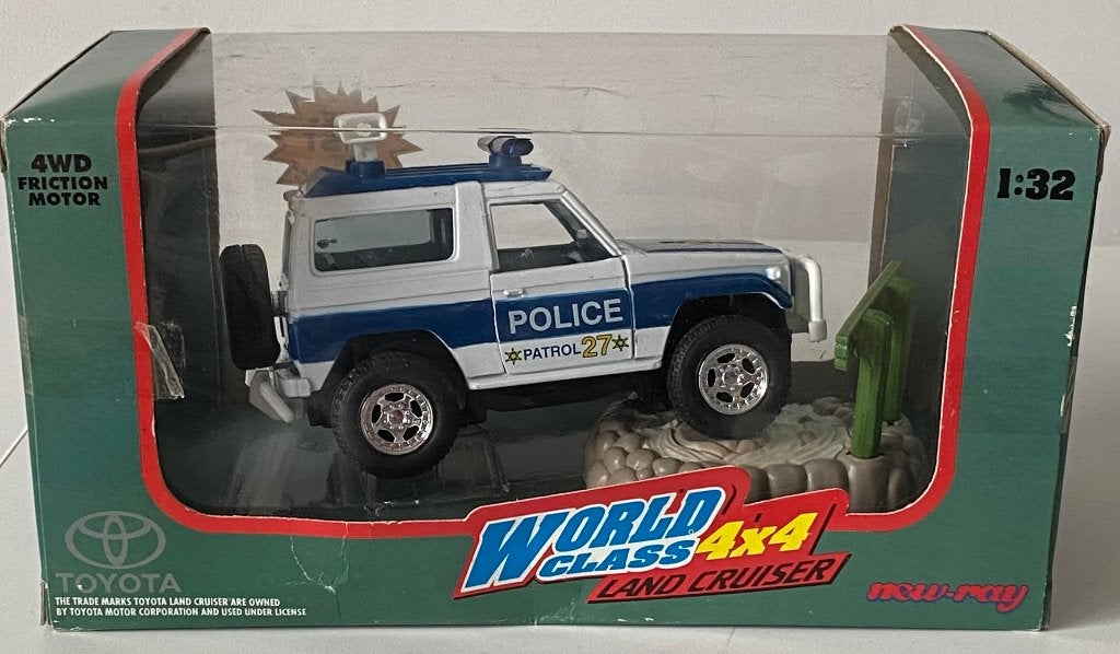 New-Ray Toyota Land Cruiser "Police Patrol" 1:32 nieuw staat, Hobby en Vrije tijd, Ophalen of Verzenden, Zo goed als nieuw, Auto