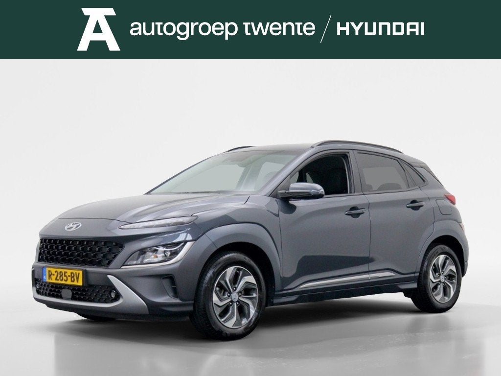 Hyundai KONA 1.6 GDI HEV Fashion | Navigatie | Trekhaak, Auto's, Stof, Gebruikt, Origineel Nederlands, 26 km/l
