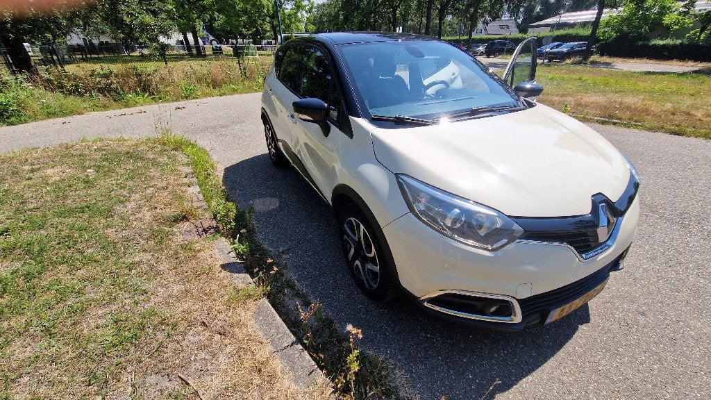 Renault Captur 2015 | 60.000 km | Benzine | Airco | Navi, Voorwielaandrijving, Stof, Zwart, Origineel Nederlands