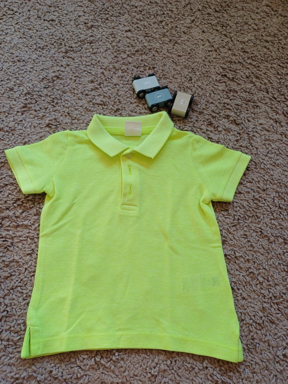 Hema neon gele polo met knoopjes maat 62., Broekje, Ophalen of Verzenden, Zo goed als nieuw, Hema