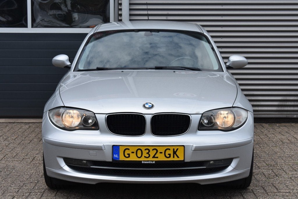 Bmw 1-SERIE 116I INTRODUCTION / STOELVERW. / CLIMA / PDC, Auto's, BMW, 1-Serie, Achterwielaandrijving, Gebruikt, 4 cilinders